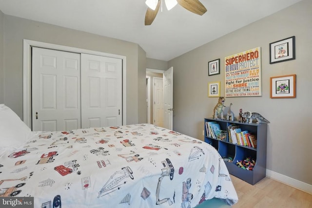 7329 Cloverhill Rd, Spotsylvania, VA 22551 - bedroom with a closet, wood finished floors, ceiling fan, and baseboards