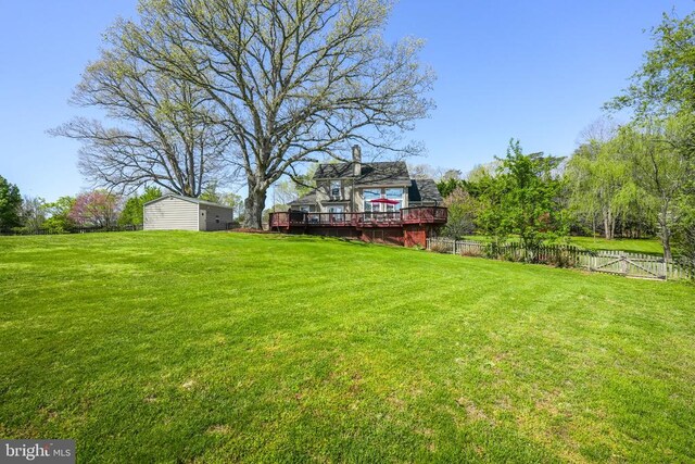 7329 Cloverhill Rd, Spotsylvania, VA 22551 - view of yard with a deck and an outdoor structure