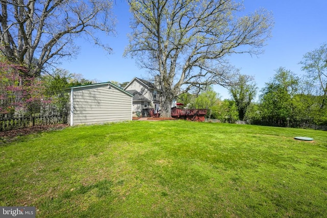 7329 Cloverhill Rd, Spotsylvania, VA 22551 - view of yard featuring an outbuilding and a deck