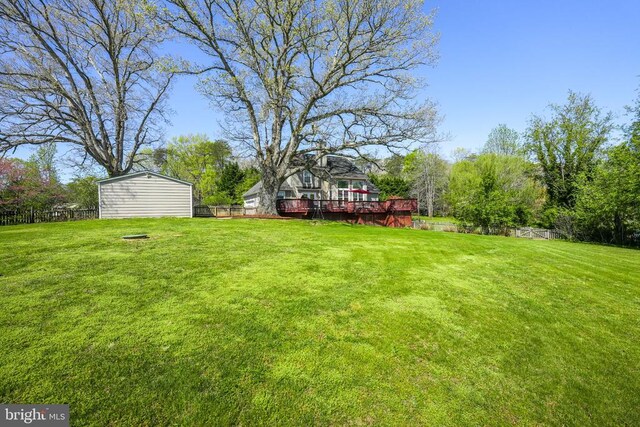 7329 Cloverhill Rd, Spotsylvania, VA 22551 - view of yard featuring a deck and an outdoor structure