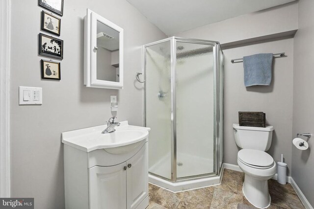7329 Cloverhill Rd, Spotsylvania, VA 22551 - full bath featuring a shower stall, vanity, baseboards, and toilet