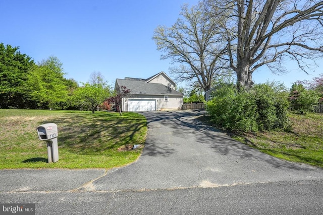 7329 Cloverhill Rd, Spotsylvania, VA 22551 - view of home's exterior with asphalt driveway and an attached garage