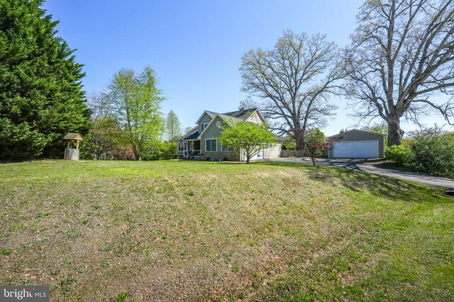 7329 Cloverhill Rd, Spotsylvania, VA 22551 - view of grassy yard featuring a garage