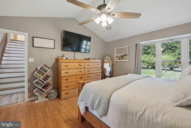 7329 Cloverhill Rd, Spotsylvania, VA 22551 - bedroom featuring vaulted ceiling, light wood-type flooring, and a ceiling fan