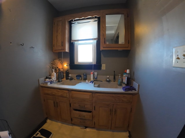 kitchen with light countertops, glass insert cabinets, and brown cabinets
