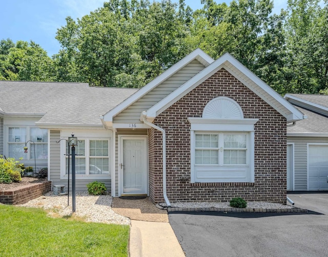 136 Emerald Dr, Harrisonburg, VA 22801 - single story home with brick siding and roof with shingles