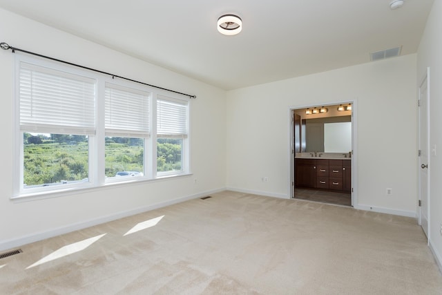 3267 Battery Park Pl, Rockingham, VA 22801 - unfurnished bedroom with light colored carpet and ensuite bathroom