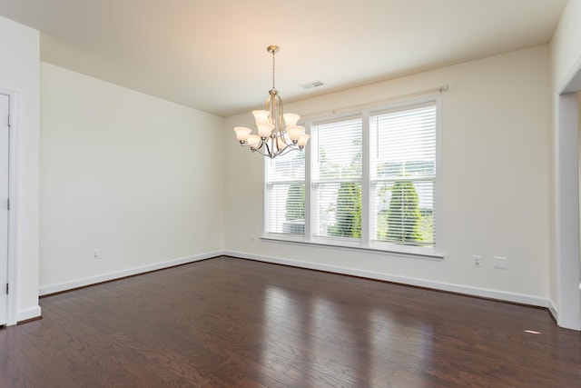 3267 Battery Park Pl, Rockingham, VA 22801 - spare room featuring dark wood finished floors and a chandelier
