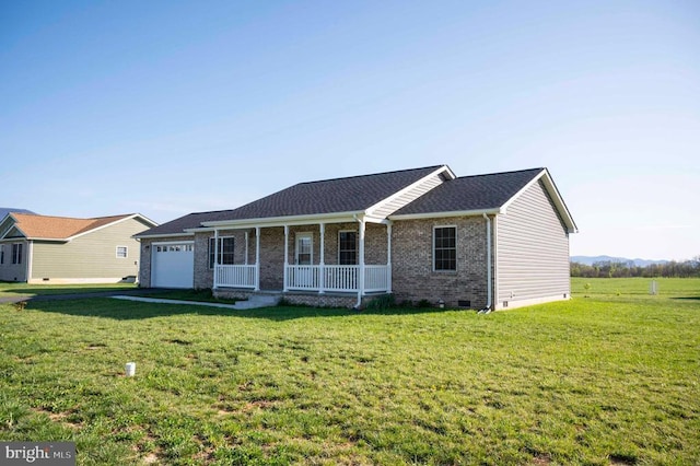 ranch-style home featuring covered porch, crawl space, a garage, a front lawn, and brick siding