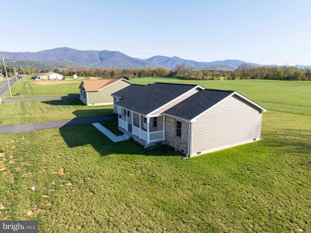 view from above of property featuring a mountainous background