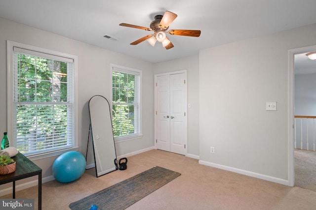 12800 Pickett Ct, Spotsylvania, VA 22551 - workout area featuring light carpet and a ceiling fan
