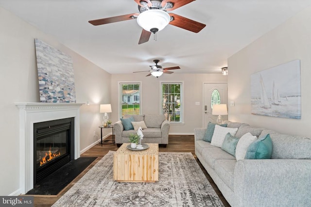 12800 Pickett Ct, Spotsylvania, VA 22551 - living room with a fireplace with flush hearth, dark wood finished floors, and ceiling fan