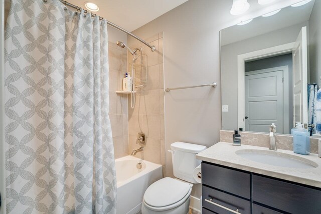 3436 Charleston Blvd, Rockingham, VA 22801 - full bathroom with toilet, shower / tub combo with curtain, and vanity