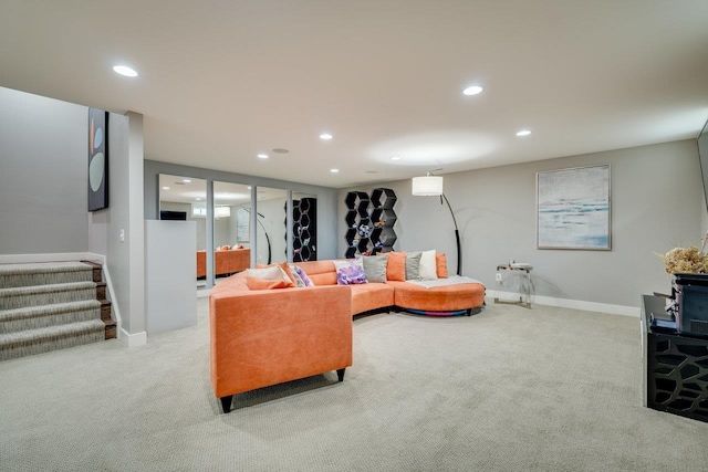 3436 Charleston Blvd, Rockingham, VA 22801 - carpeted living room with stairway, baseboards, and recessed lighting