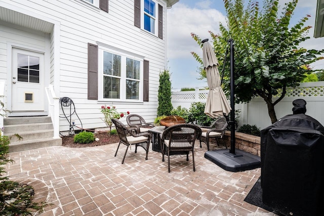 3436 Charleston Blvd, Rockingham, VA 22801 - view of patio featuring a grill, entry steps, outdoor lounge area, and a fenced backyard