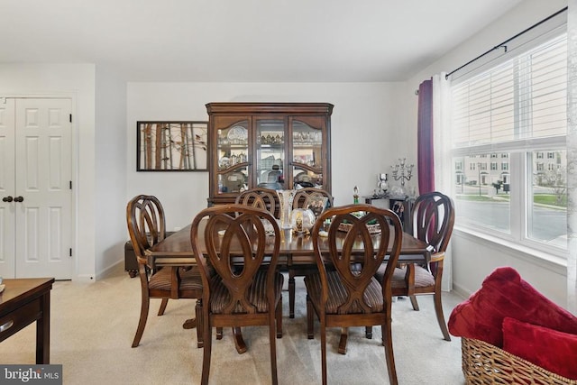 2348 Silver Fox Way, Locust Grove, VA 22508 - dining room with light colored carpet, plenty of natural light, and baseboards