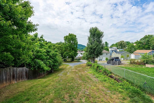 822 Beverley St W, Staunton, VA 24401 - view of yard featuring fence, driveway, and a residential view