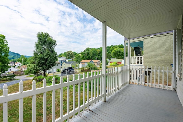 822 Beverley St W, Staunton, VA 24401 - wooden deck featuring a lawn, a residential view, and fence