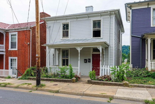 822 Beverley St W, Staunton, VA 24401 - view of front of house with a porch and a chimney