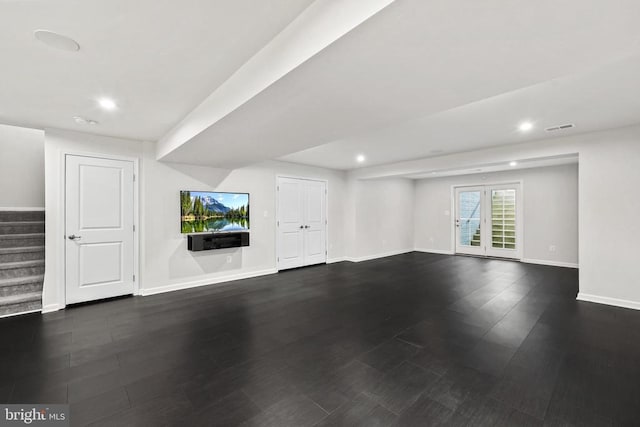 unfurnished living room featuring recessed lighting, baseboards, dark wood-style flooring, visible vents, and stairs