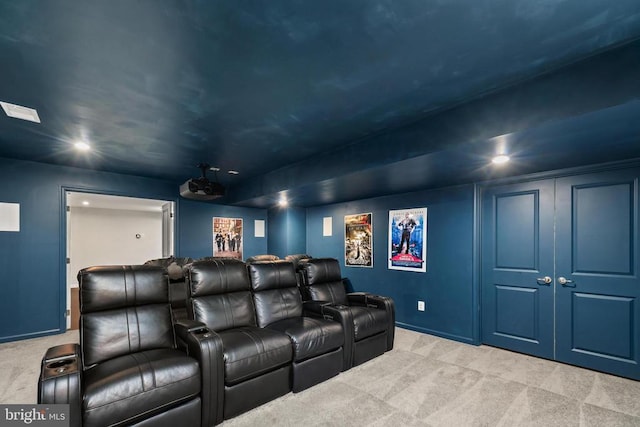carpeted home theater room with recessed lighting