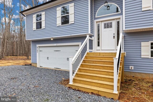 property entrance featuring a garage