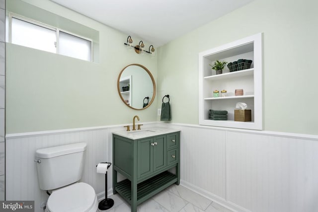 5915 Copper Mountain Dr W, Spotsylvania, VA 22553 - bathroom with vanity, a wainscoted wall, and marble look tile flooring