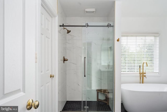 5915 Copper Mountain Dr W, Spotsylvania, VA 22553 - full bath featuring a marble finish shower and a freestanding tub