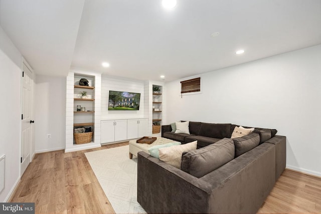 5915 Copper Mountain Dr W, Spotsylvania, VA 22553 - living area featuring light wood-style flooring, recessed lighting, built in features, and a fireplace