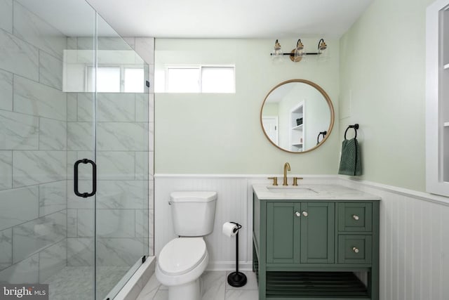 5915 Copper Mountain Dr W, Spotsylvania, VA 22553 - bathroom with marble finish floors, wainscoting, vanity, and a stall shower