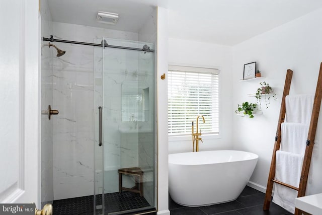 5915 Copper Mountain Dr W, Spotsylvania, VA 22553 - full bathroom featuring a marble finish shower, tile patterned flooring, and a soaking tub