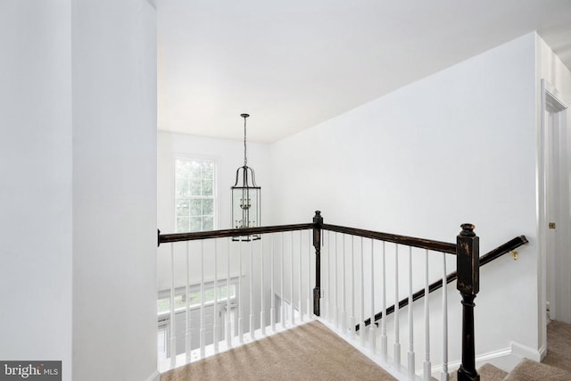5915 Copper Mountain Dr W, Spotsylvania, VA 22553 - hall with an upstairs landing and a chandelier