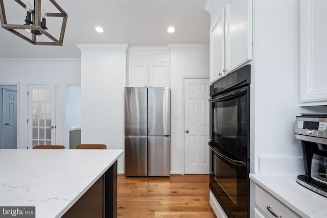 5915 Copper Mountain Dr W, Spotsylvania, VA 22553 - kitchen featuring freestanding refrigerator, ornamental molding, white cabinetry, light wood finished floors, and recessed lighting