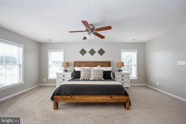 5915 Copper Mountain Dr W, Spotsylvania, VA 22553 - carpeted bedroom featuring multiple windows and a ceiling fan