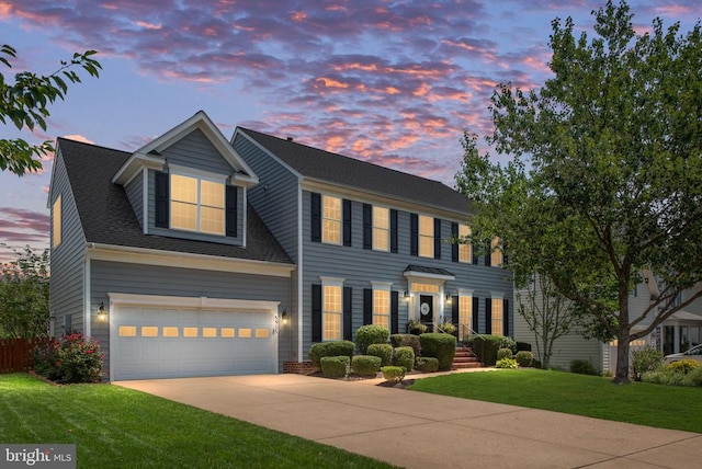 5915 Copper Mountain Dr W, Spotsylvania, VA 22553 - colonial inspired home featuring driveway, a front lawn, an attached garage, and a shingled roof