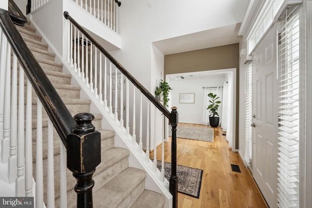 5915 Copper Mountain Dr W, Spotsylvania, VA 22553 - entryway with wood-type flooring, stairway, and a high ceiling