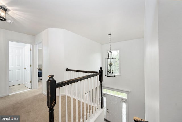 5915 Copper Mountain Dr W, Spotsylvania, VA 22553 - stairway with a chandelier, plenty of natural light, and carpet flooring