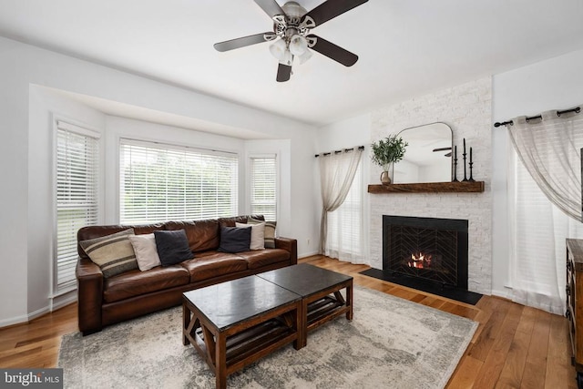 5915 Copper Mountain Dr W, Spotsylvania, VA 22553 - living room featuring a fireplace, wood finished floors, and ceiling fan