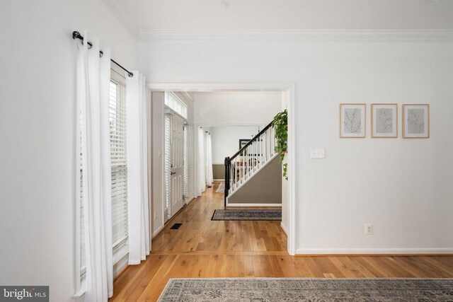 5915 Copper Mountain Dr W, Spotsylvania, VA 22553 - corridor featuring wood finished floors, crown molding, and stairway