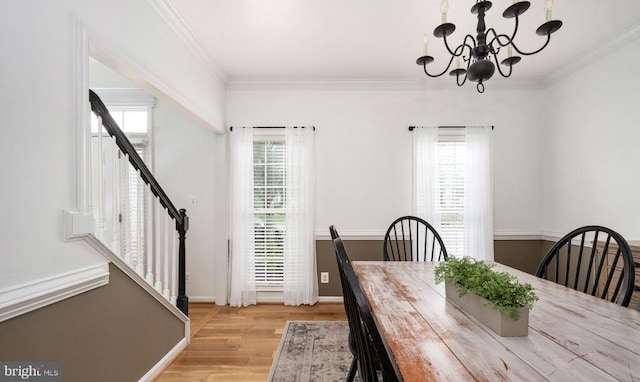 5915 Copper Mountain Dr W, Spotsylvania, VA 22553 - dining room with a chandelier, crown molding, light wood finished floors, and stairway