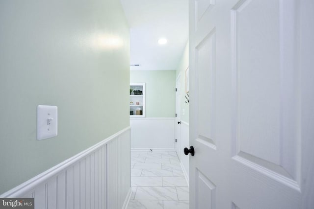 5915 Copper Mountain Dr W, Spotsylvania, VA 22553 - hall with light marble finish flooring and wainscoting