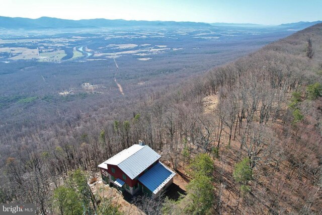 301 Mountain Top Dr, Luray, VA 22835 - view of subject property with a heavily wooded area and a mountain backdrop
