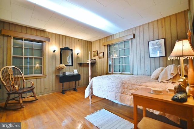 301 Mountain Top Dr, Luray, VA 22835 - bedroom featuring wood finished floors and wooden walls