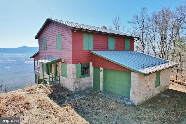 301 Mountain Top Dr, Luray, VA 22835 - view of front facade with stone siding, metal roof, and a standing seam roof