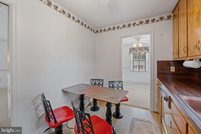 101 Deerwood Rd, Charlottesville, VA 22911 - dining space with light carpet and ceiling fan