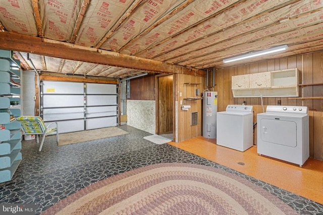 101 Deerwood Rd, Charlottesville, VA 22911 - laundry room with water heater, independent washer and dryer, and wooden walls