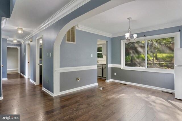 11719 Gordon Rd, Fredericksburg, VA 22407 - empty room featuring arched walkways, a chandelier, wood-type flooring, and crown molding