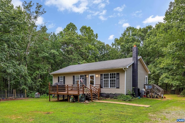 1409 Mica Rd, Mineral, VA 23117 - view of front of home featuring a chimney, a deck, and a front lawn