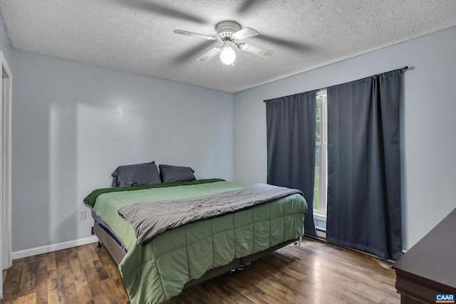 1409 Mica Rd, Mineral, VA 23117 - bedroom featuring wood finished floors, a textured ceiling, and a ceiling fan