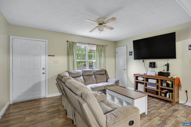 1409 Mica Rd, Mineral, VA 23117 - living room featuring wood finished floors, a ceiling fan, and a textured ceiling